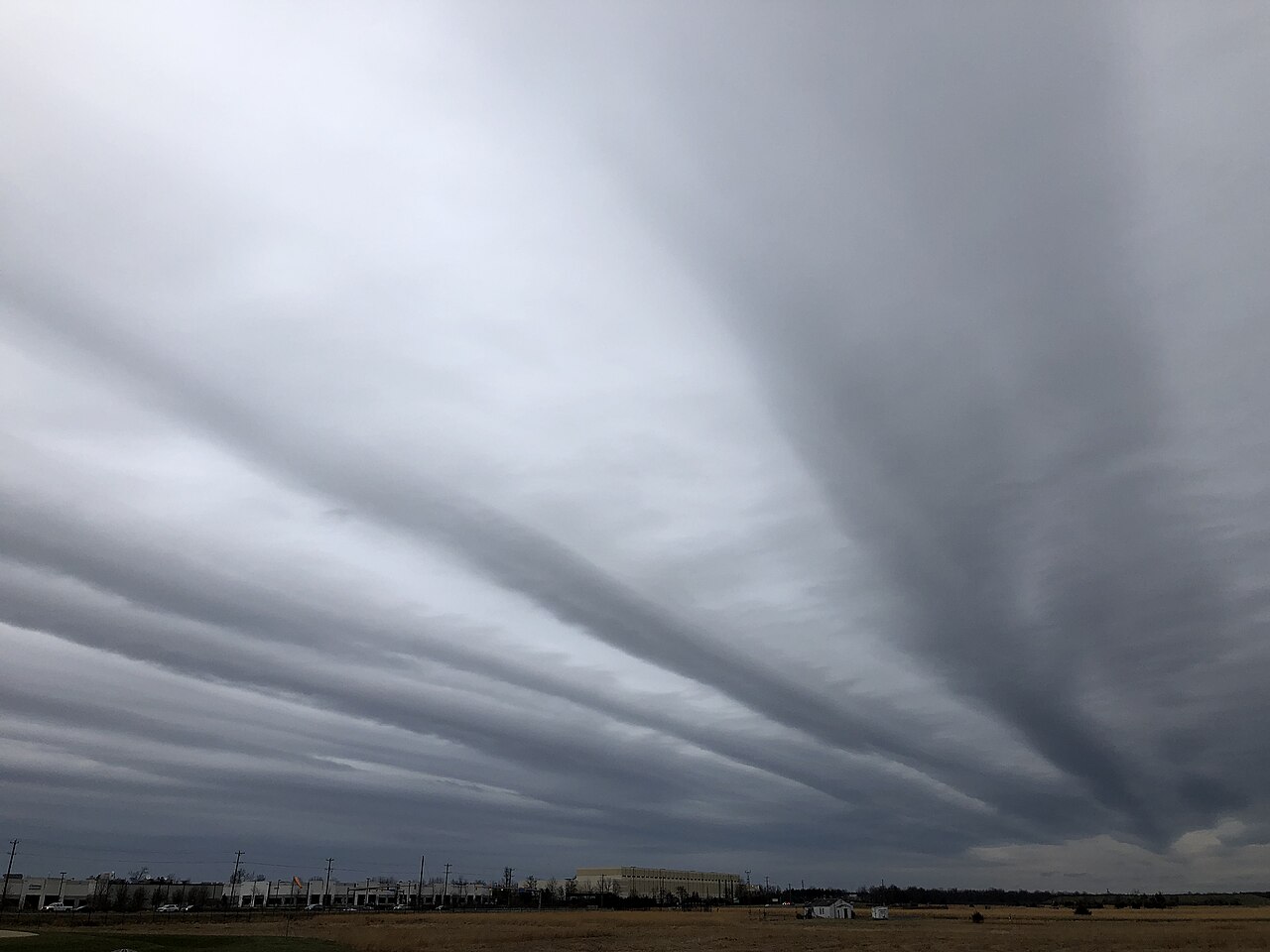 Altostratus radiatus cloud showing distinctive parallel bands