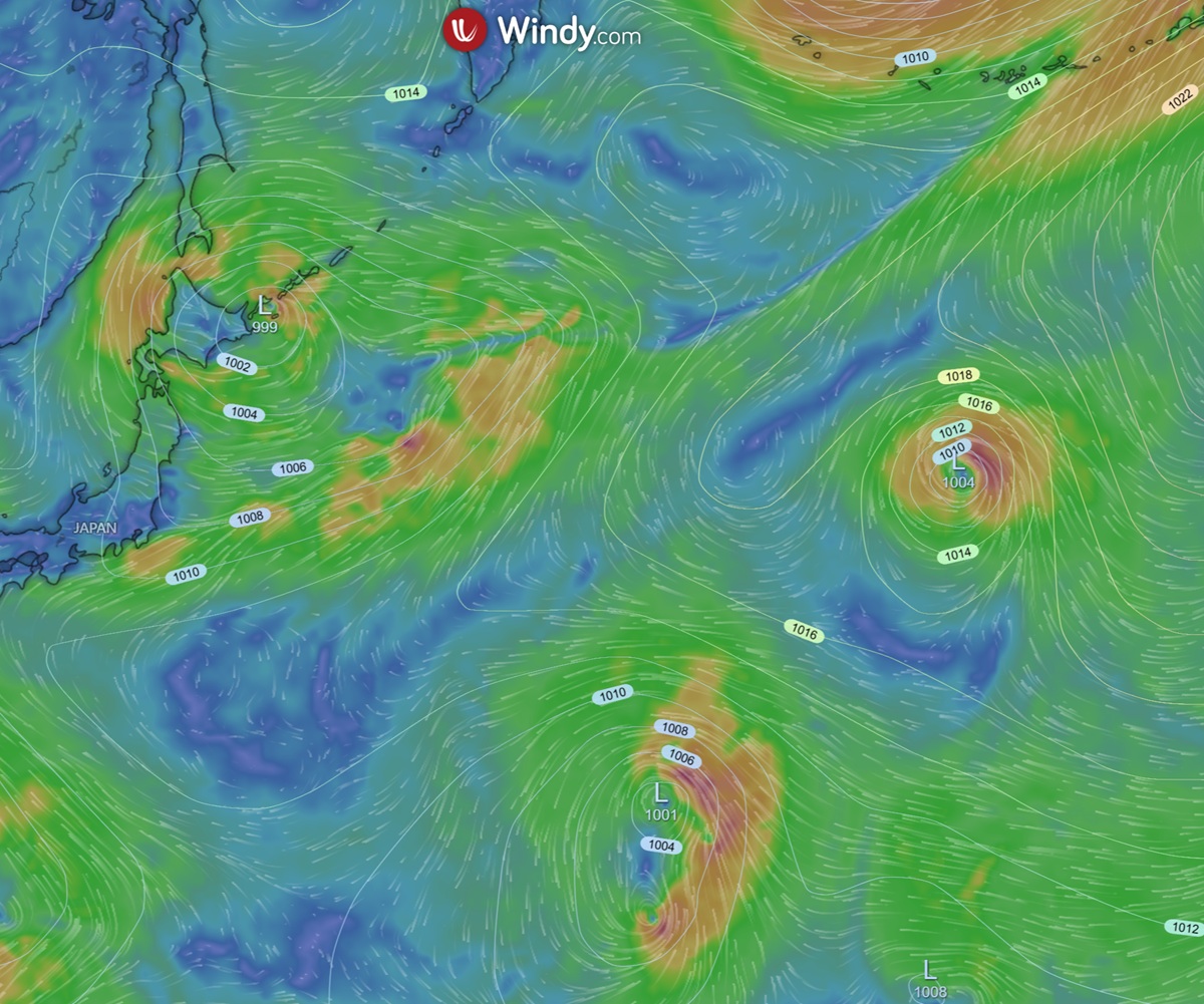 Meteorological map showing multiple low-pressure systems (L) with swirling wind patterns and isobar lines over Japan. Meteorological map showing multiple low-pressure systems (L) with swirling wind patterns and isobar lines over Japan.
